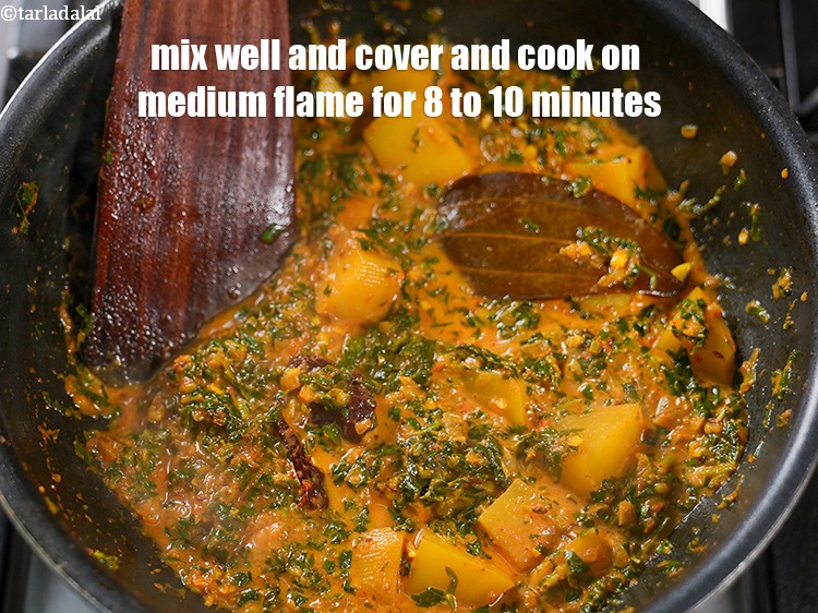 Step 32 – Mix well and cover and cook on medium flame for 8 to 10 minutes.