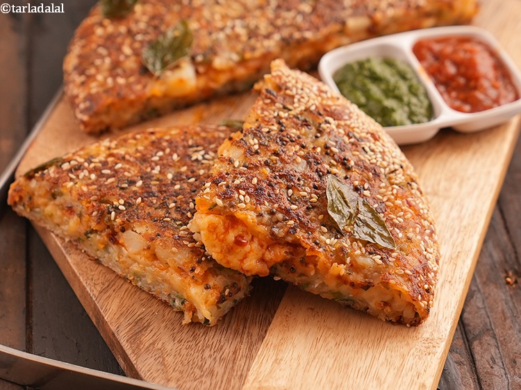 Step 31 – <strong>Potato Handvo recipe</strong> is a savory, steamed cake made with a flavorful batter of grated …