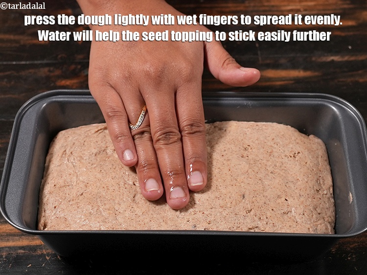 Step 31 – Press the dough lightly with wet fingers to spread it evenly. Water will help the …