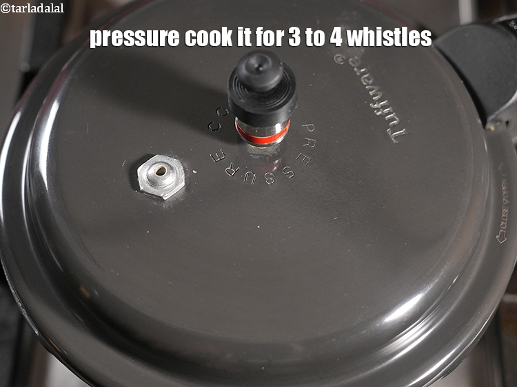 Step 31 – Pressure cook it for 3 to 4 whistles.