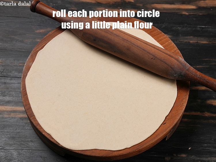 Step 32 – Roll each portion into a 225 mm. (9&rdquo;) diameter circle using a little plain flour …