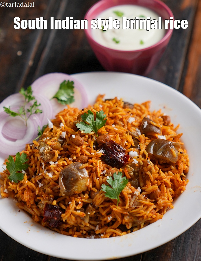 Step 33 – Serve <strong>brinjal rice</strong> hot garnished with freshly grated coconut.