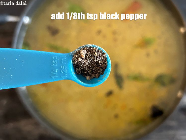 स्टेप 32 – स्वाद के लिए ताज़ा पिसी काली मिर्च डालें। हमने 1/8 …