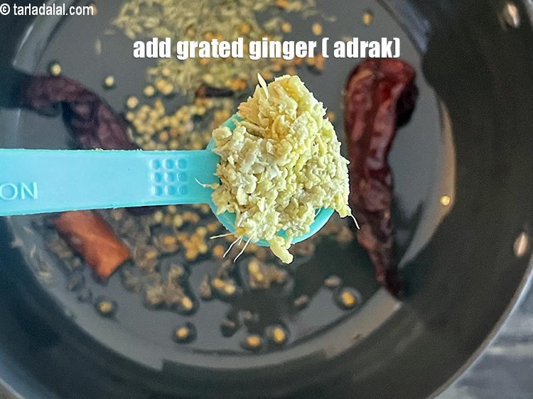 Step 33 – Add&nbsp;<meta charset="UTF-8" />1/2 tsp&nbsp;<a href="glossary-grated-ginger-943i">grated ginger (adrak)</a>.