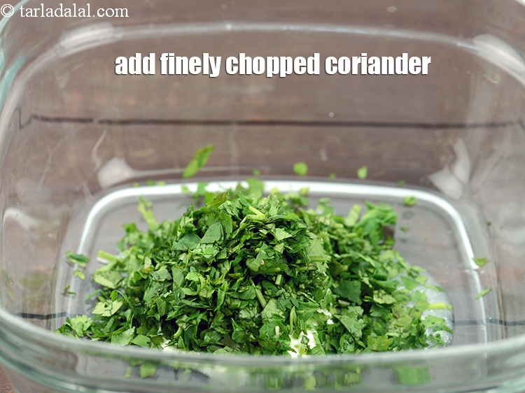 Step 37 – Add &frac14; cup&nbsp;finely&nbsp;<a href="https://www.tarladalal.com/glossary-chopped-coriander-783i">chopped coriander (dhania)</a>.