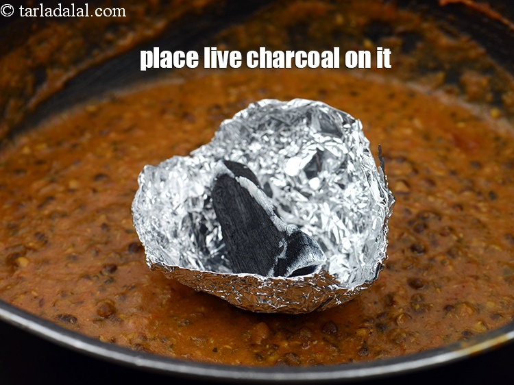 Step 32 – Place live charcoal on it.