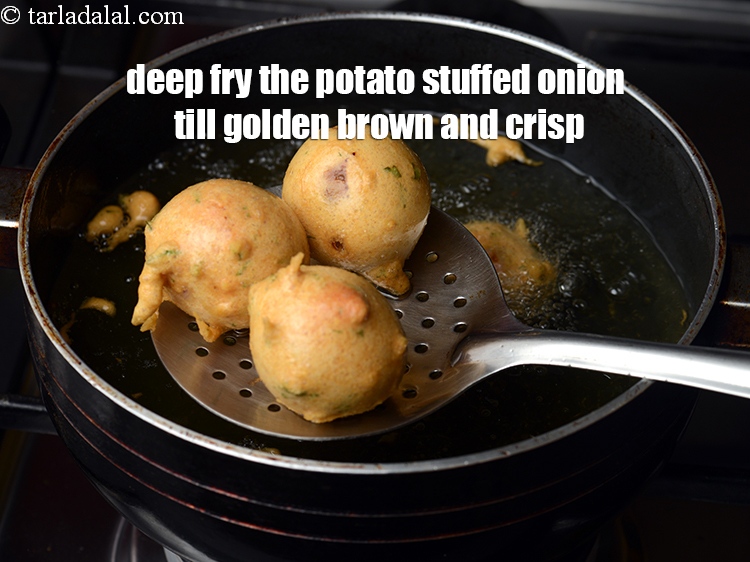 Step 36 – Deep fry the potato stuffed onion till golden brown and crisp.