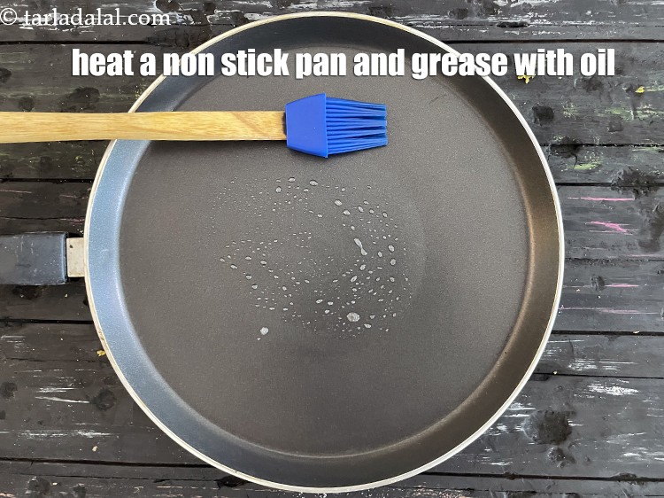 Step 40 – Heat a non-stick tava (griddle) and grease it with oil.