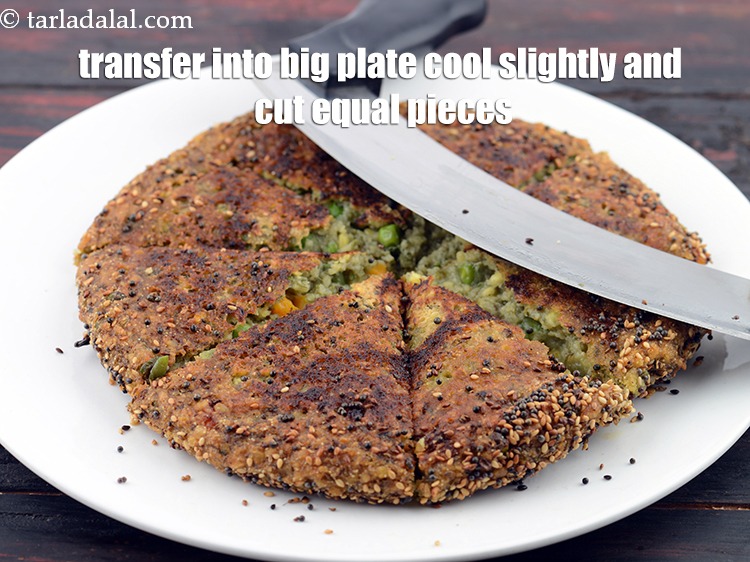 Step 30 – Transfer into a big plate or a chopping board, cool slightly and cut into equal …