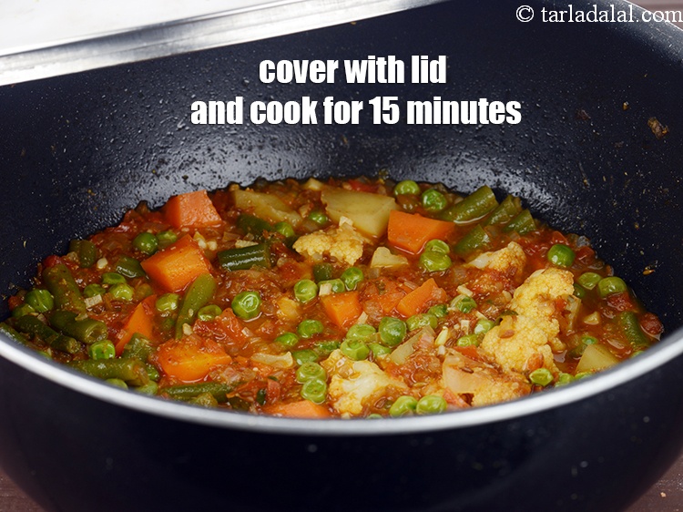 Step 33 – Cover with a lid and cook on a medium flame for 15 minutes, while stirring …