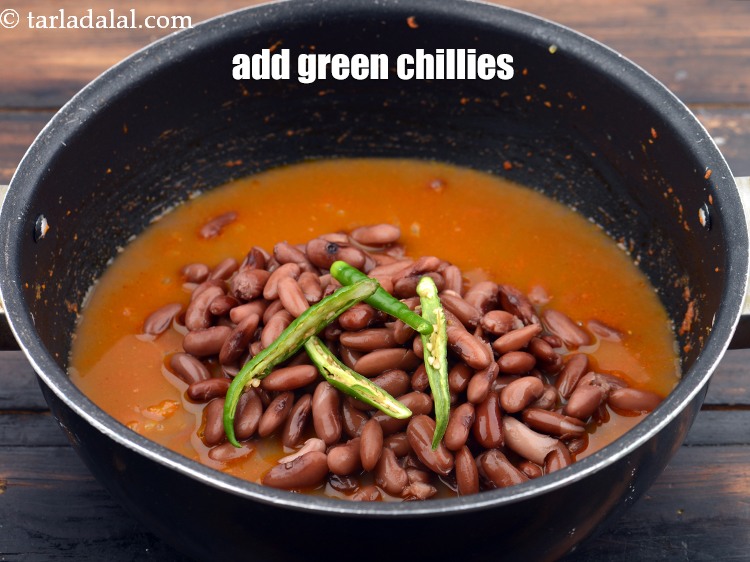 Step 33 – Add 2&nbsp;<a href="https://www.tarladalal.com/glossary-sliced-green-chillies-936i">sliced green chillies</a>.