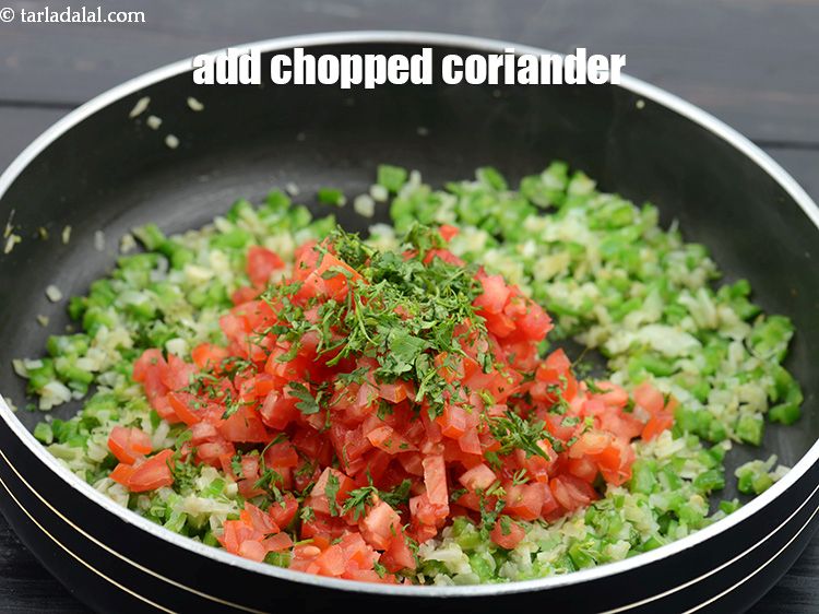 Step 33 – Add 1 tbsp finely&nbsp;<a href="https://www.tarladalal.com/glossary-chopped-coriander-783i">chopped coriander (dhania)</a>.&nbsp;