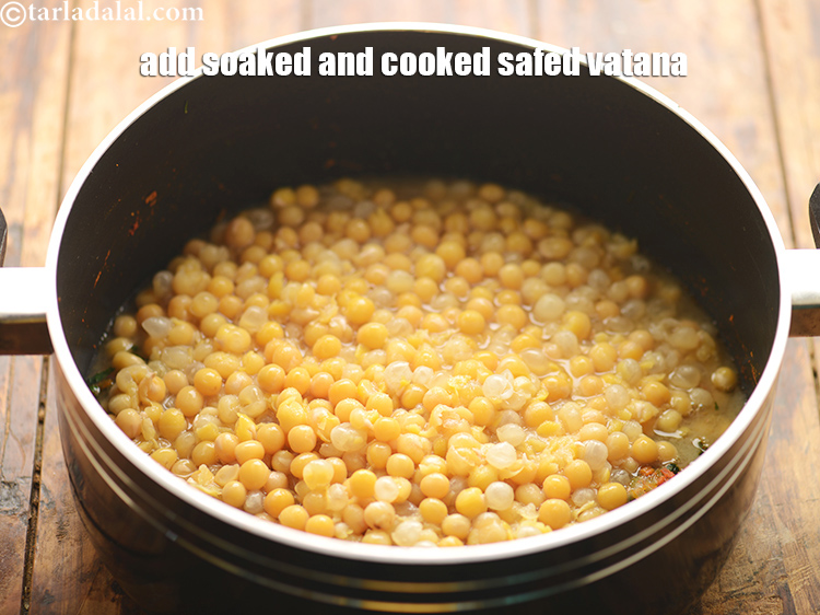 Step 47 – Add the soaked and cooked safed vatana (along with the water in which they were …