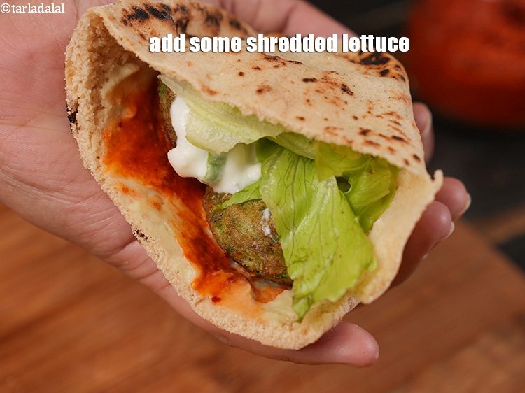 Step 35 – Add some shredded lettuce.