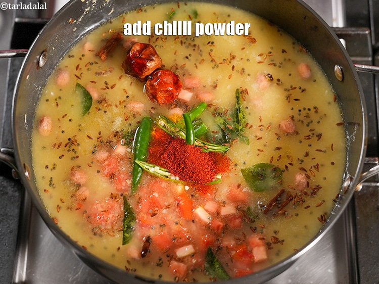 Step 33 – Add &frac12; tsp <a href="https://www.tarladalal.com/glossary-chilli-powder-red-chilli-powder-339i">chilli powder</a>.