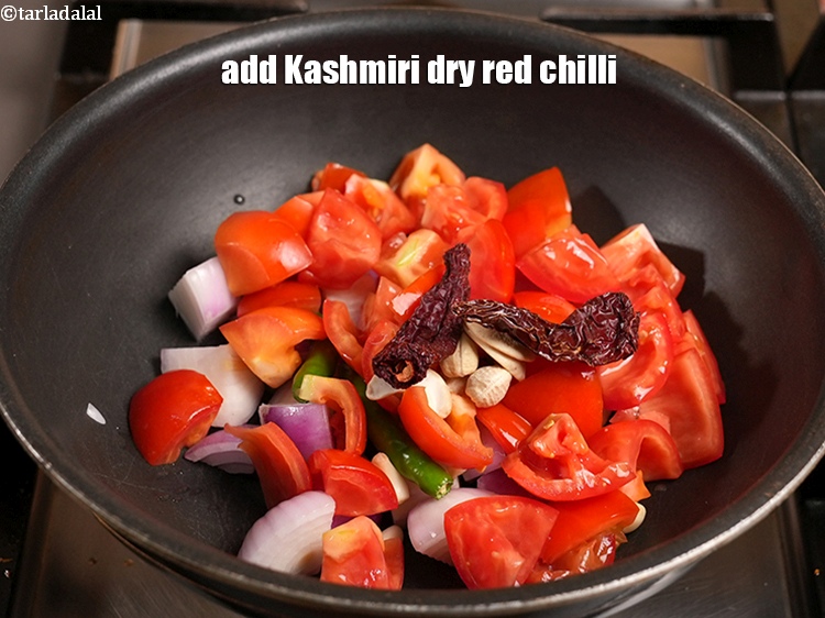 Step 34 – Add 2 Kashmiri dry red chilli.