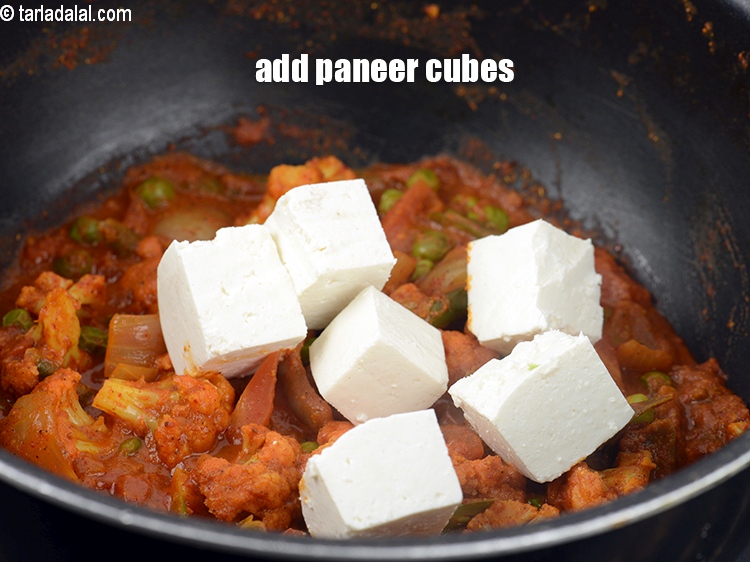 Step 34 – Add &frac12; cup <a href="https://www.tarladalal.com/glossary-paneer-cubes-cottage-cheese-cubes-1002i">paneer (cottage cheese) cubes</a>.