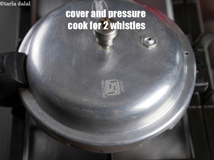 Step 33 – Cover with a lid and pressure cook for 2 whistles.