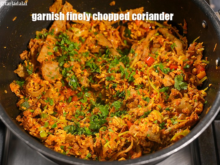 Step 33 – Garnish with 2 tbsp finely <a href="https://www.tarladalal.com/glossary-chopped-coriander-783i">chopped coriander (dhania)</a> and mix well.