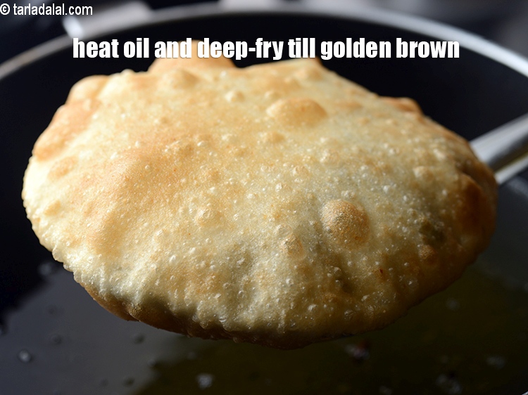 Step 33 – Heat the oil in a deep non-stick kadhai and deep-fry a few puris at a …