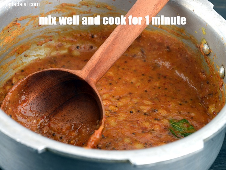 Step 34 – Mix well and cook on a medium flame for 1 minute.