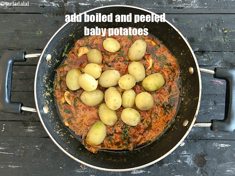 Step 41 – Add&nbsp;<meta charset="UTF-8" />14 to 16&nbsp;boiled and peeled&nbsp;<a href="glossary-baby-potatoes-chote-aloo-715i">baby potatoes</a>.