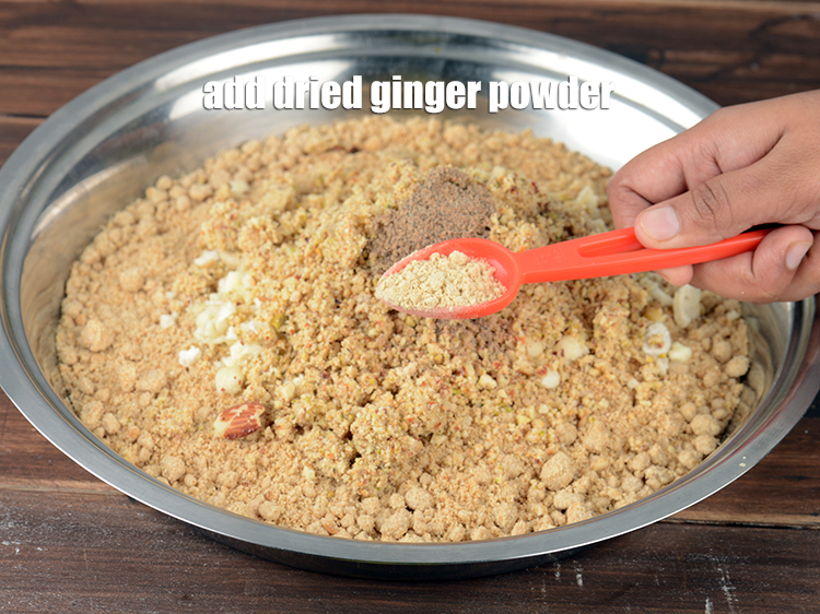 Step 33 – Add &frac12; tbsp <a href="https://www.tarladalal.com/glossary-dried-ginger-powder-sonth-454i">dried ginger powder (sonth)</a>.