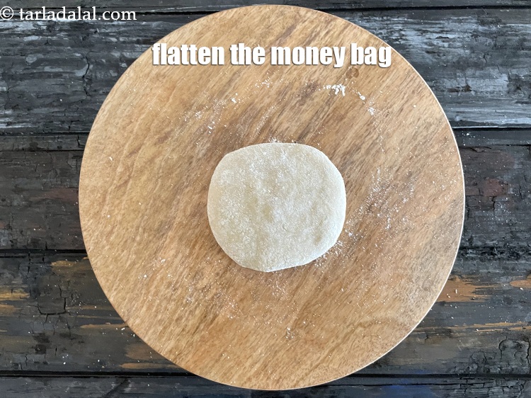 Step 34 – Flatten the money bag.