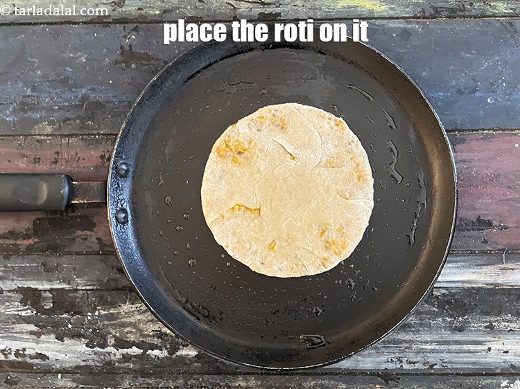 Step 37 – <meta charset="UTF-8" />Place the roti on it.&nbsp;
