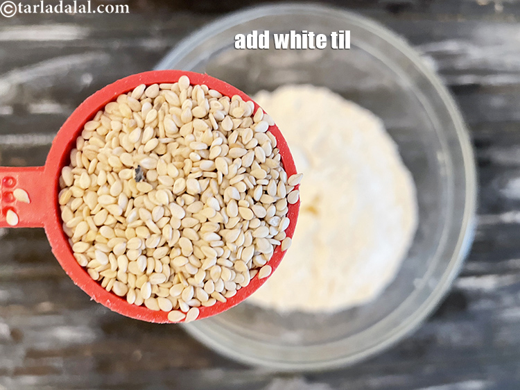 Step 40 – Add 2 tbls white til (white sesame seeds).