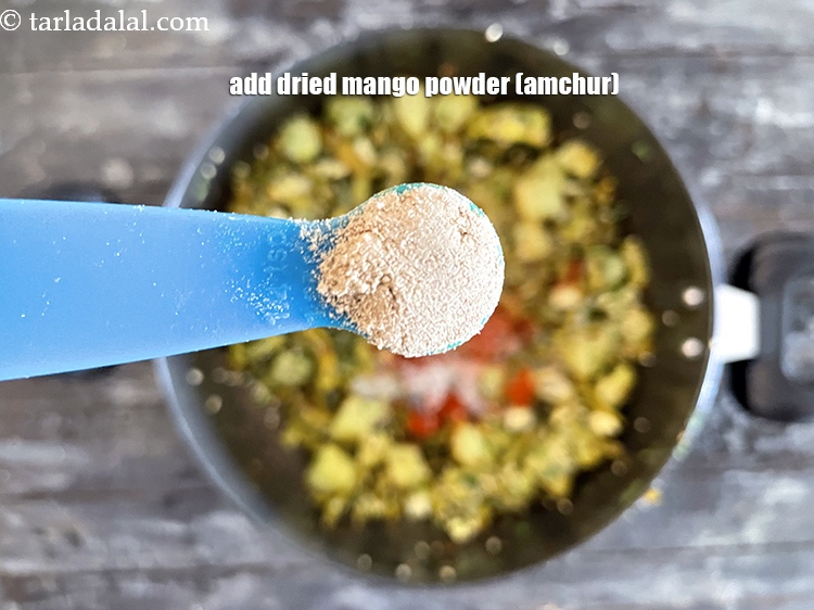 Step 33 – Add&nbsp;<meta charset="UTF-8" />1/4 tsp&nbsp;<a href="glossary-dried-mango-powder-amchur-powder-148i">dried mango powder (amchur)</a>.
