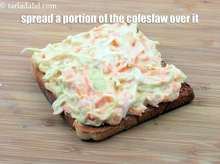 Step 34 – Spread a portion of the coleslaw evenly over it.