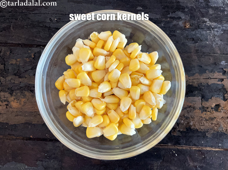 Step 2 – Take 1/2 cup sweet corn kernels.