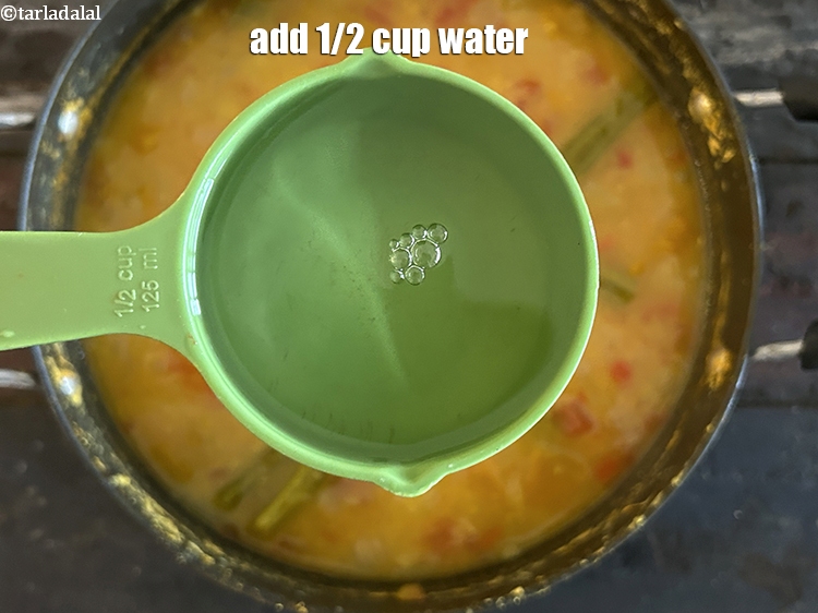 Step 35 – <p>Add&nbsp;<strong>1/2 </strong>cup of water.</p>