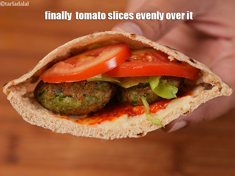 Step 36 – Finally tomato slices evenly over it.