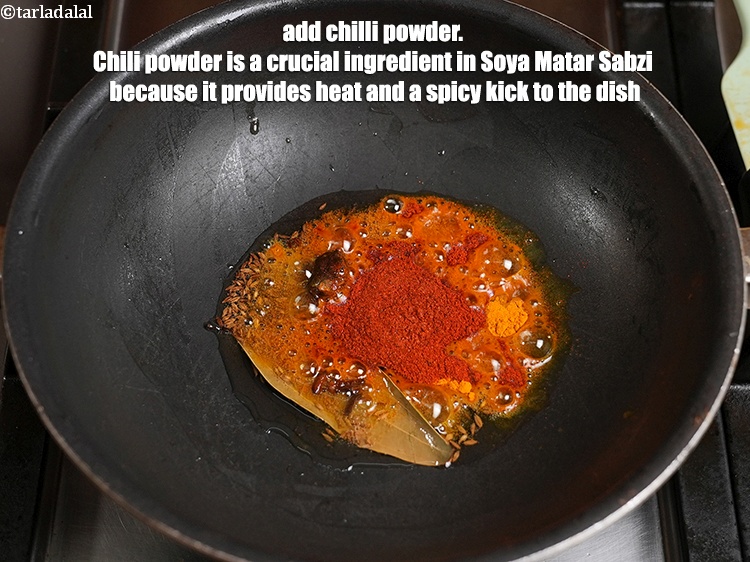 स्टेप 34 – २ टी-स्पून&nbsp;<a href="https://www.tarladalal.com/glossary-chilli-powder-red-chilli-powder-hindi-339i">मिर्च पाउडर</a> डालें. सोया मटर सब्जी में मिर्च …