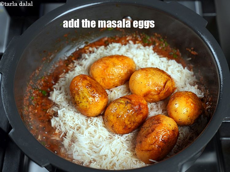Step 35 – Add the masala eggs.