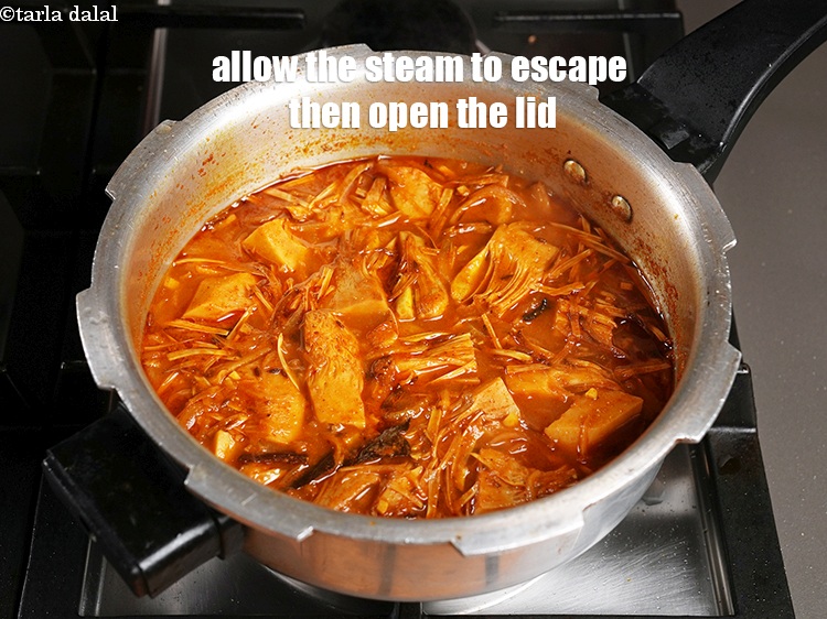 Step 34 – Allow the steam to escape before opening the lid.