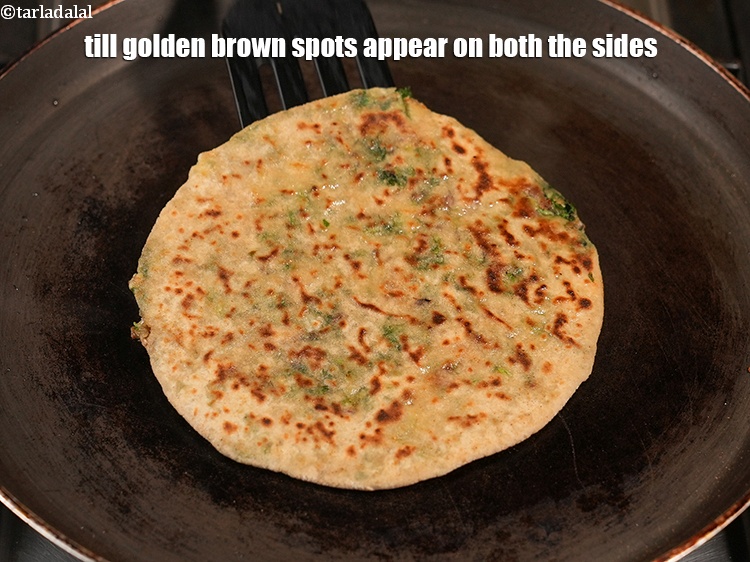 Step 35 – Till golden brown spots appear on both the sides.