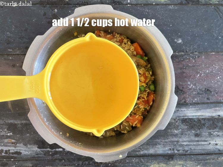 Step 34 – Add <strong>1 1/2 cups of hot water.</strong>