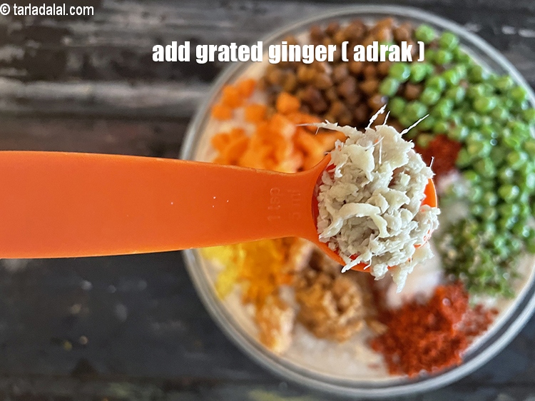 Step 34 – Add 1 tsp grated ginger, adrak.