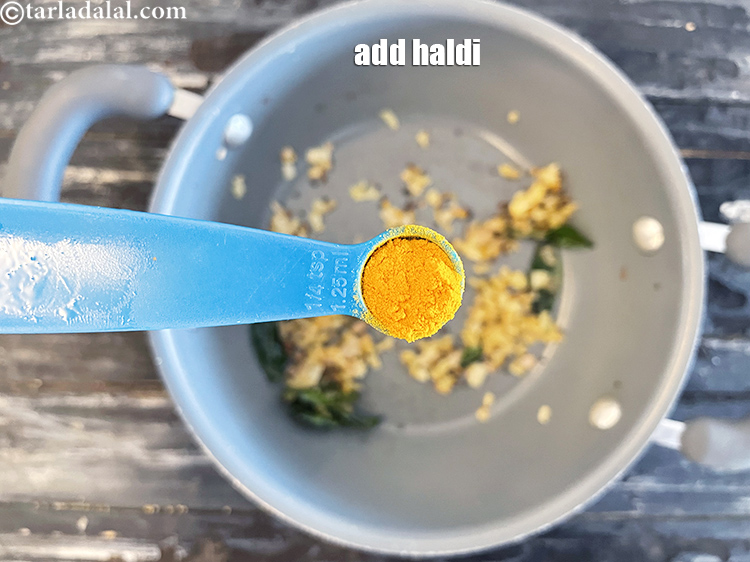 Step 42 – Add&nbsp;<meta charset="UTF-8" />1/4 tsp&nbsp;<a href="glossary-turmeric-powder-haldi-645i">turmeric powder (haldi)</a>.