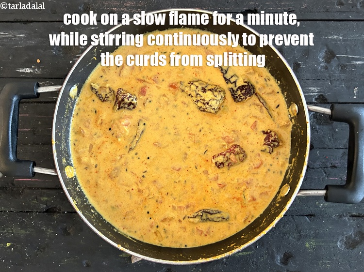 Step 40 – Cook on a slow flame for a minute, <strong>while stirring continuously to prevent&nbsp;the curds from …