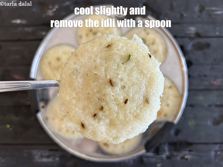 Step 35 – <p>Cool slightly and remove the&nbsp;<strong>quick rava&nbsp;idli | South Indian rava idli | quick sooji idli …