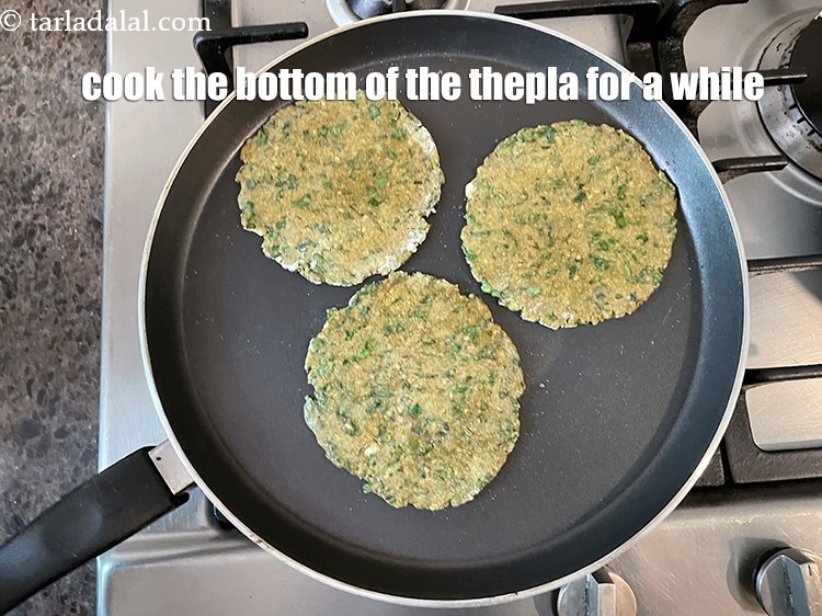 Step 42 – Cook the bottom of the thepla for a while.