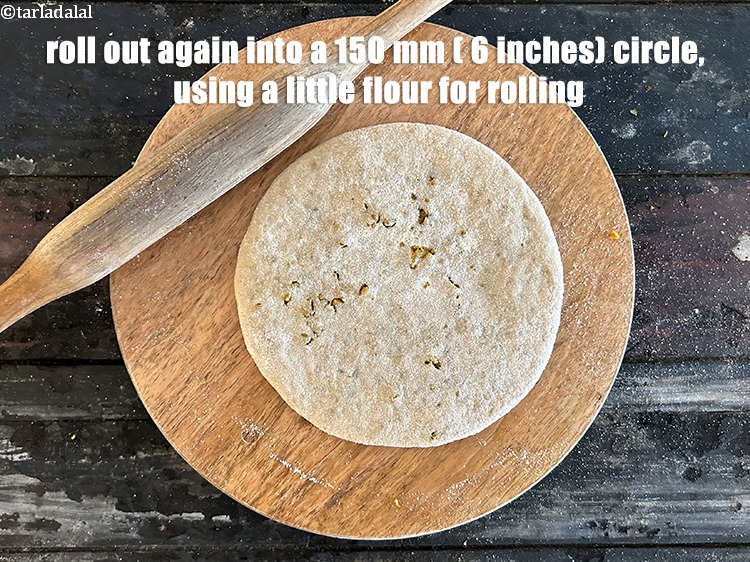 Step 39 – Roll out again into a 150 mm. (6&quot;) diameter circle, using a little whole wheat …