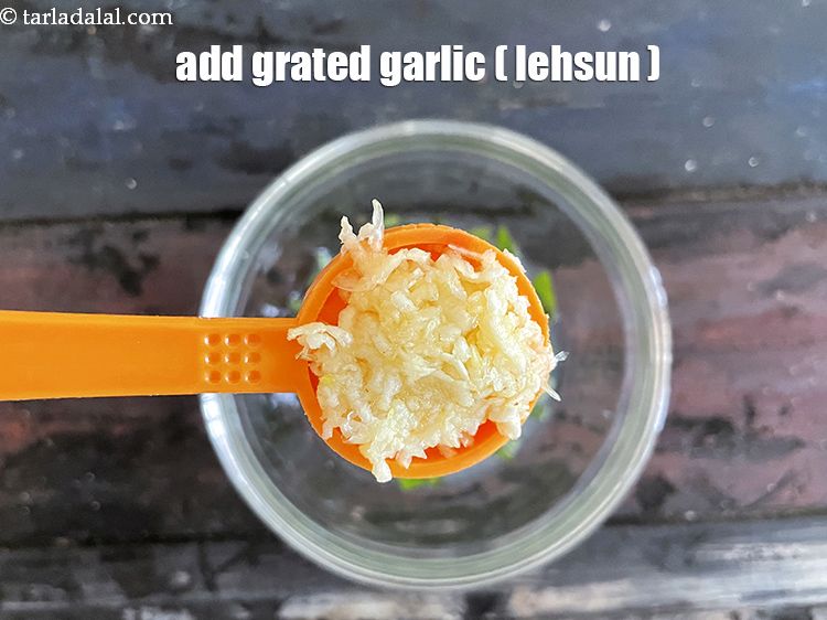 Step 34 – Add&nbsp;<meta charset="UTF-8" />1/4 tsp&nbsp;<a href="glossary-grated-garlic-859i">grated garlic (lehsun)</a>.