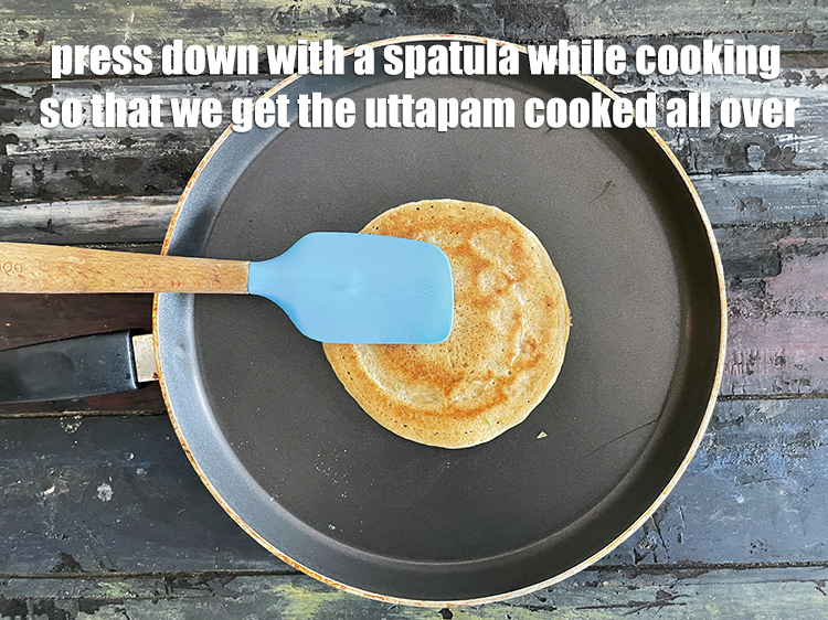 Step 38 – Press down with a spatula while cooking the uttapam again so that the filling sticks …