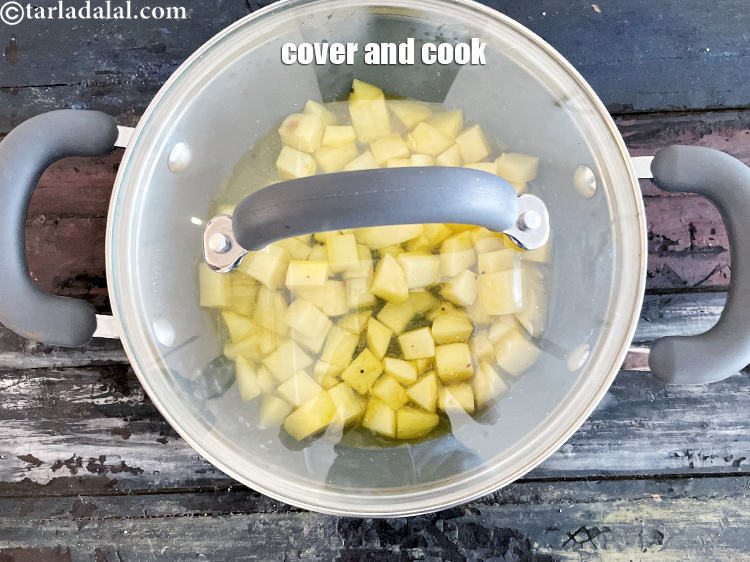 Step 34 – Cover and cook on a medium flame for 8 minutes, while stirring occasionally.