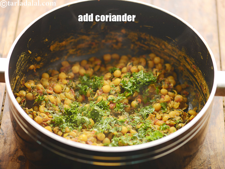Step 49 – Add 1&nbsp;tbsp&nbsp;finely&nbsp;<a href="https://www.tarladalal.com/glossary-chopped-coriander-783i">chopped coriander (dhania)</a>.&nbsp;Coriander is a fresh herb often used as a flavour enhancer …